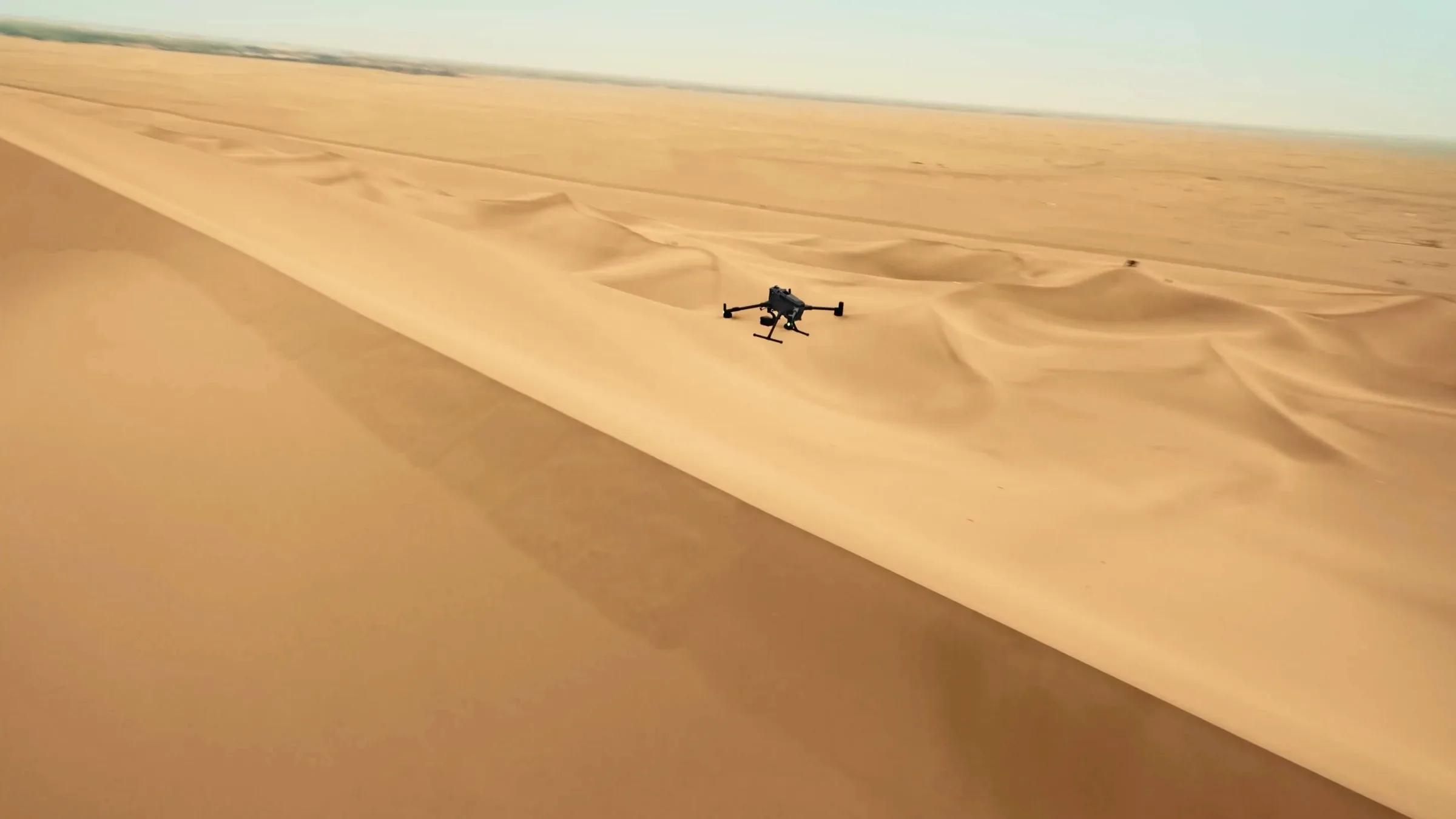 DJI Matrice 400 flying low over remote desert terrain