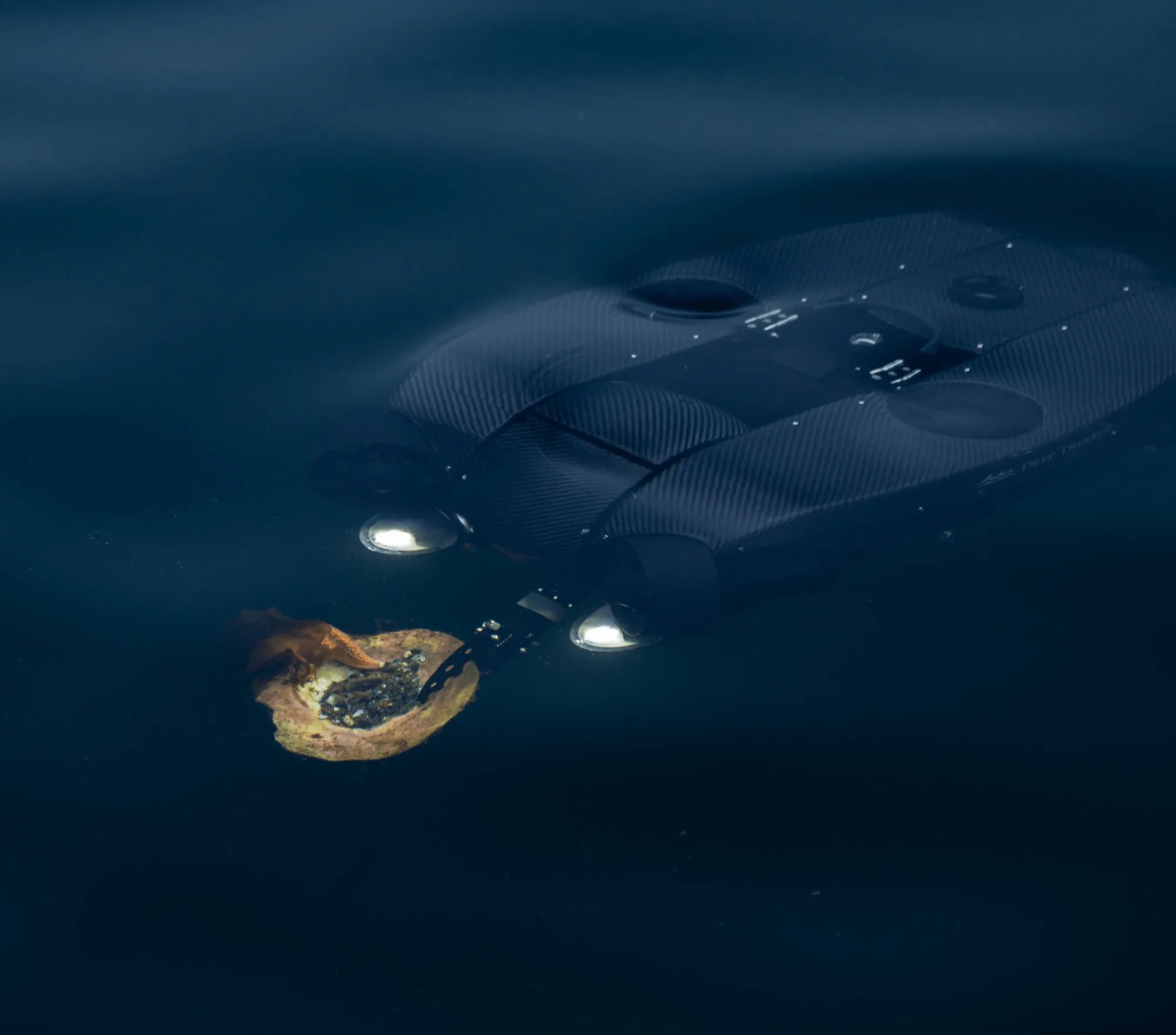 Deep Trekker REVOLUTION ROV mid-water on a tethered dive